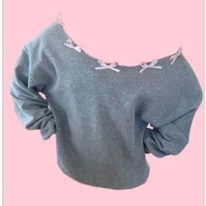 Reworked sweatshirt with bows